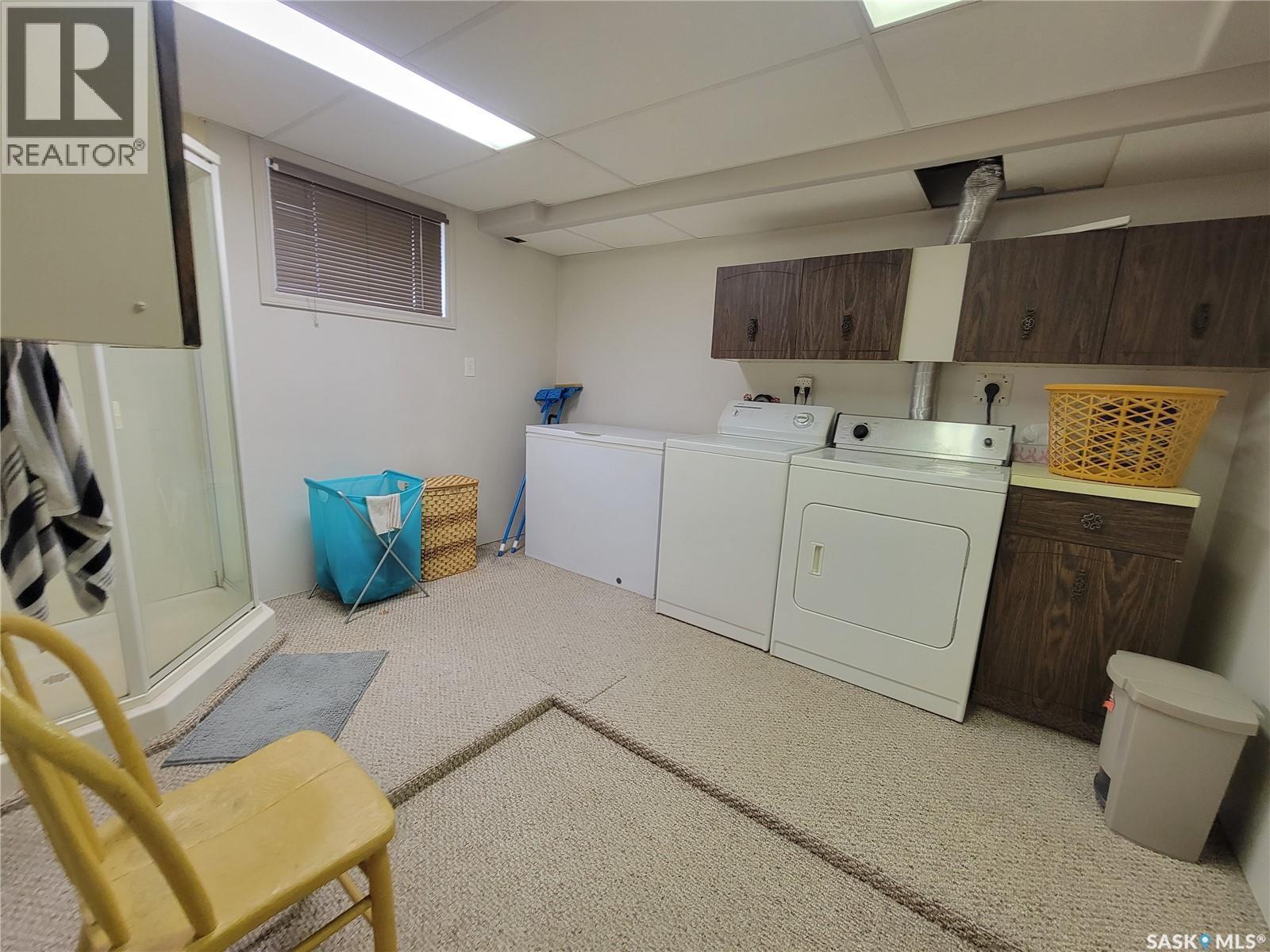 303 3 Street E, Wilkie, SK - Indoor Photo Showing Laundry Room
