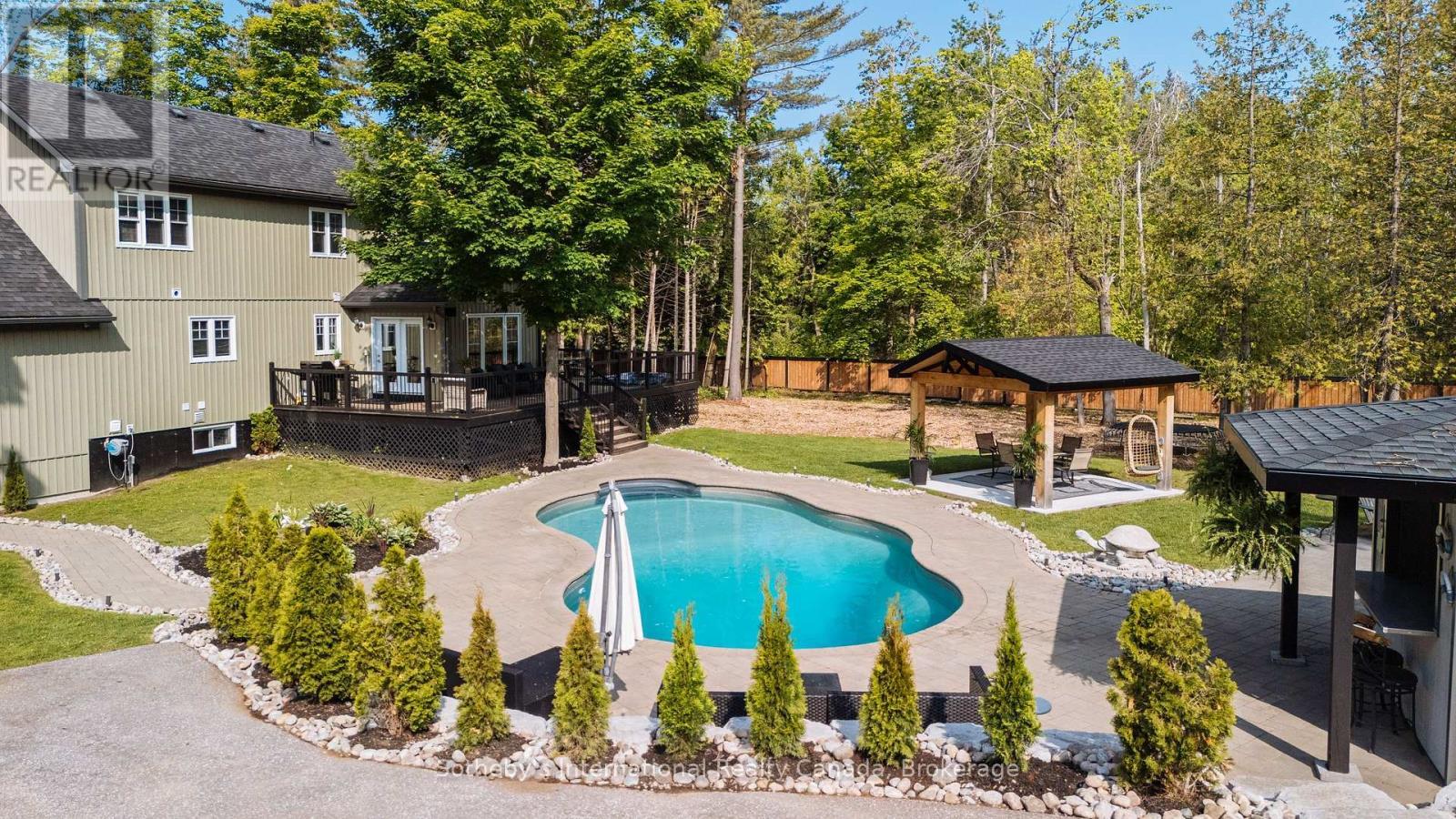 129 Bass Line, Oro-Medonte (Prices Corners), ON - Outdoor With In Ground Pool With Deck Patio Veranda