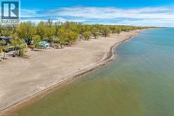 Expansive sandy beach frontage with direct water access -