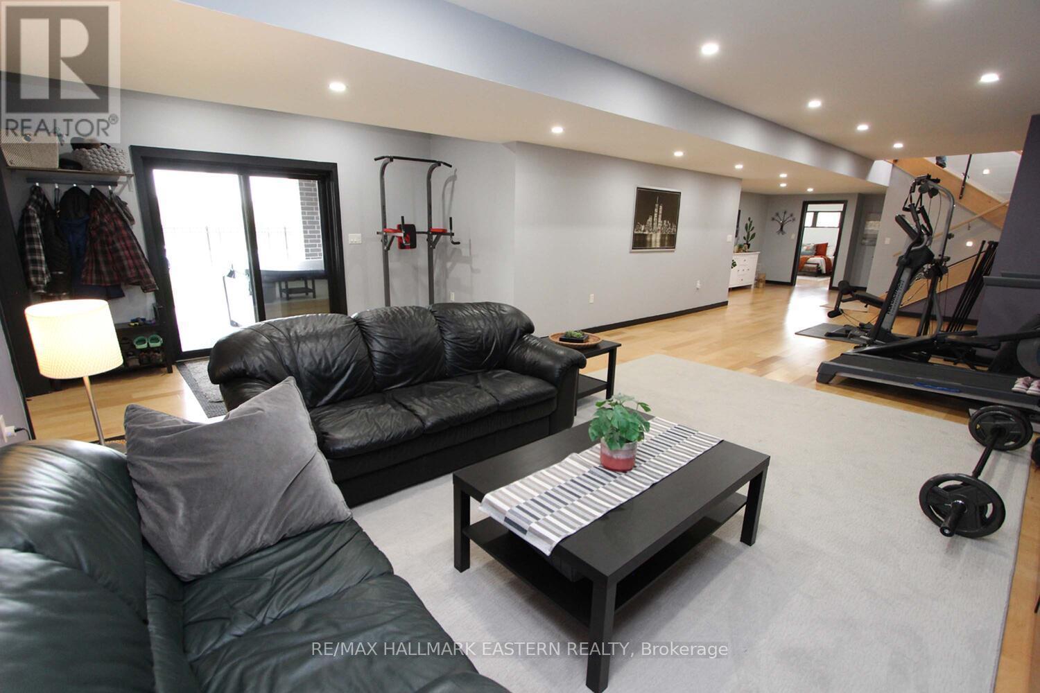 Lower Level Family Room w/o to Hot Tub and Pool - 1483 Webster Road, Douro-Dummer, ON - Indoor
