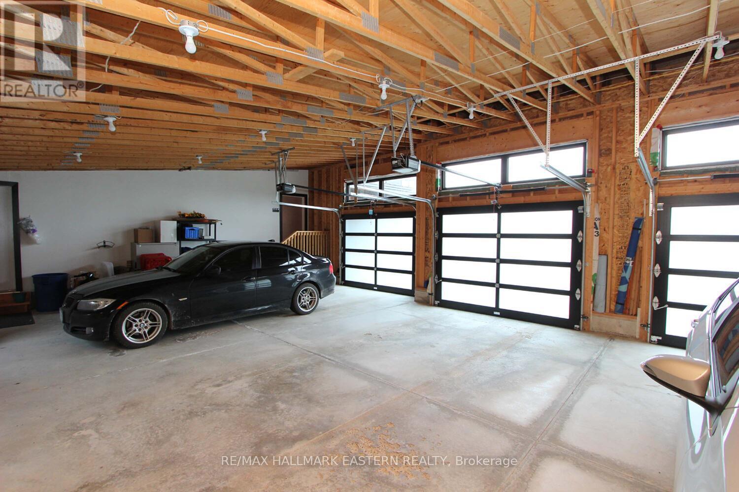 Attached 3-Bay Garage - 1483 Webster Road, Douro-Dummer, ON - Indoor Photo Showing Garage