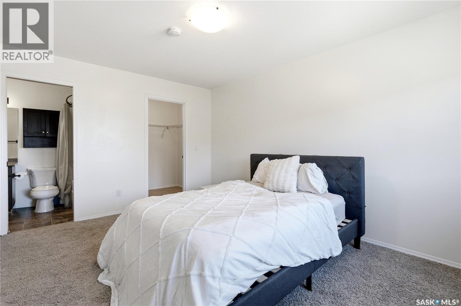 570 150 Langlois Way, Saskatoon, SK - Indoor Photo Showing Bedroom