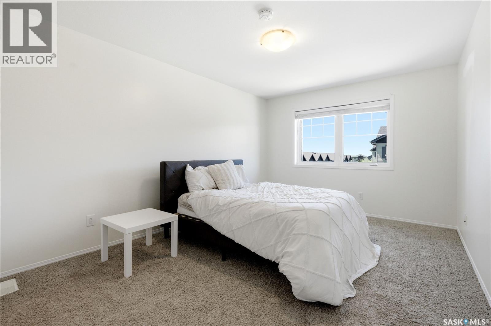 570 150 Langlois Way, Saskatoon, SK - Indoor Photo Showing Bedroom