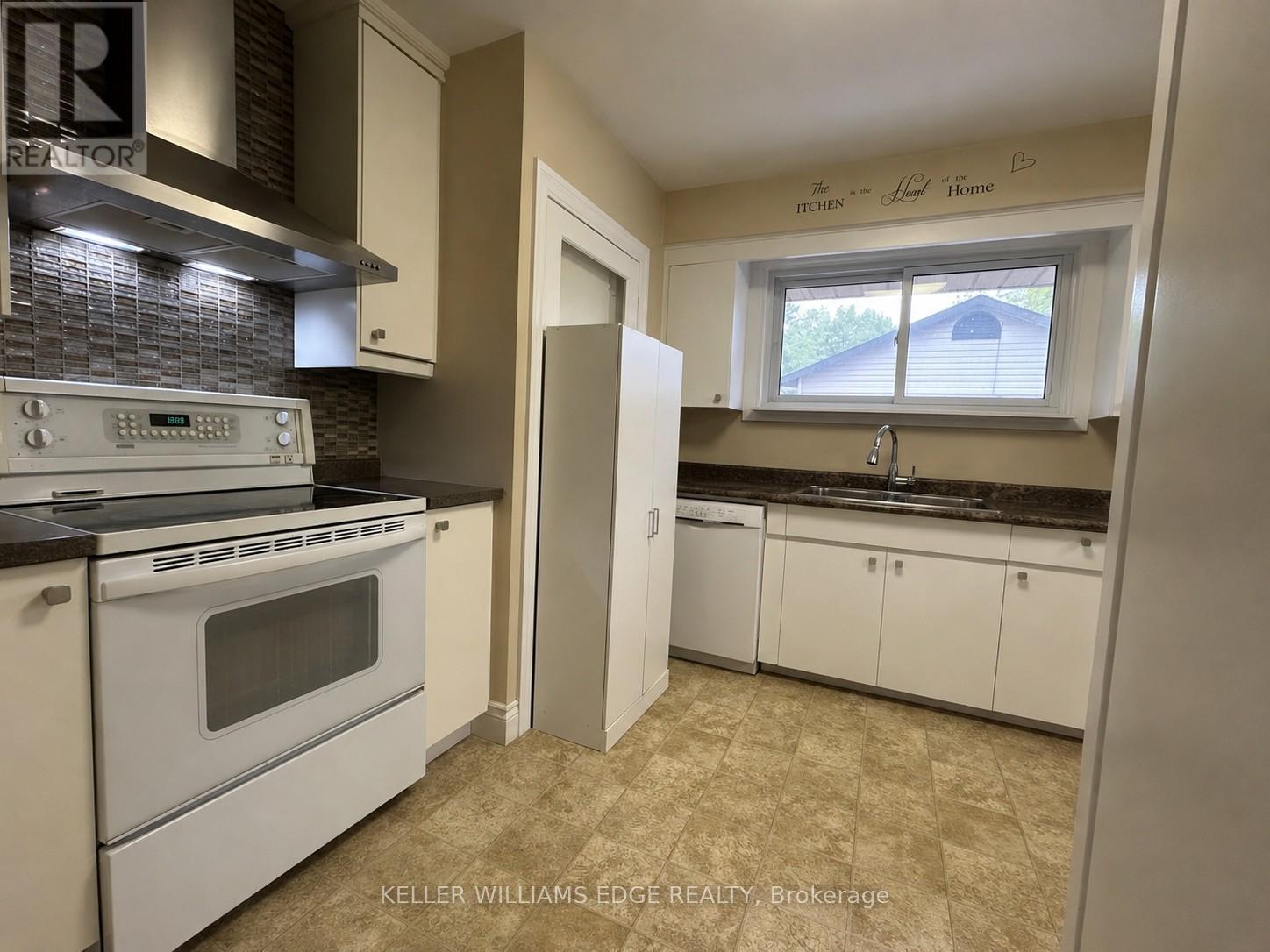 Main Floor Kitchen - 917 Orpha Street, Burlington, ON - Indoor Photo Showing Kitchen With Double Sink