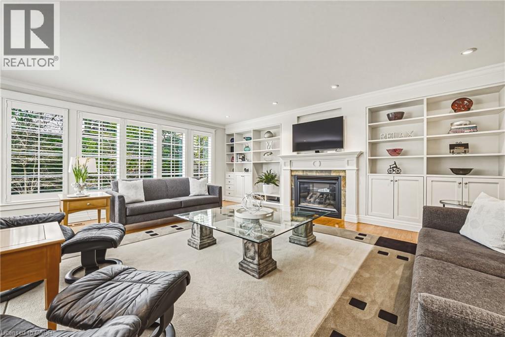 7 Colonial Crescent, Oakville, ON - Indoor Photo Showing Living Room With Fireplace