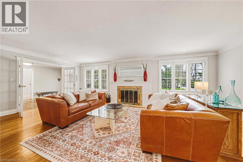 7 Colonial Crescent, Oakville, ON - Indoor Photo Showing Living Room With Fireplace