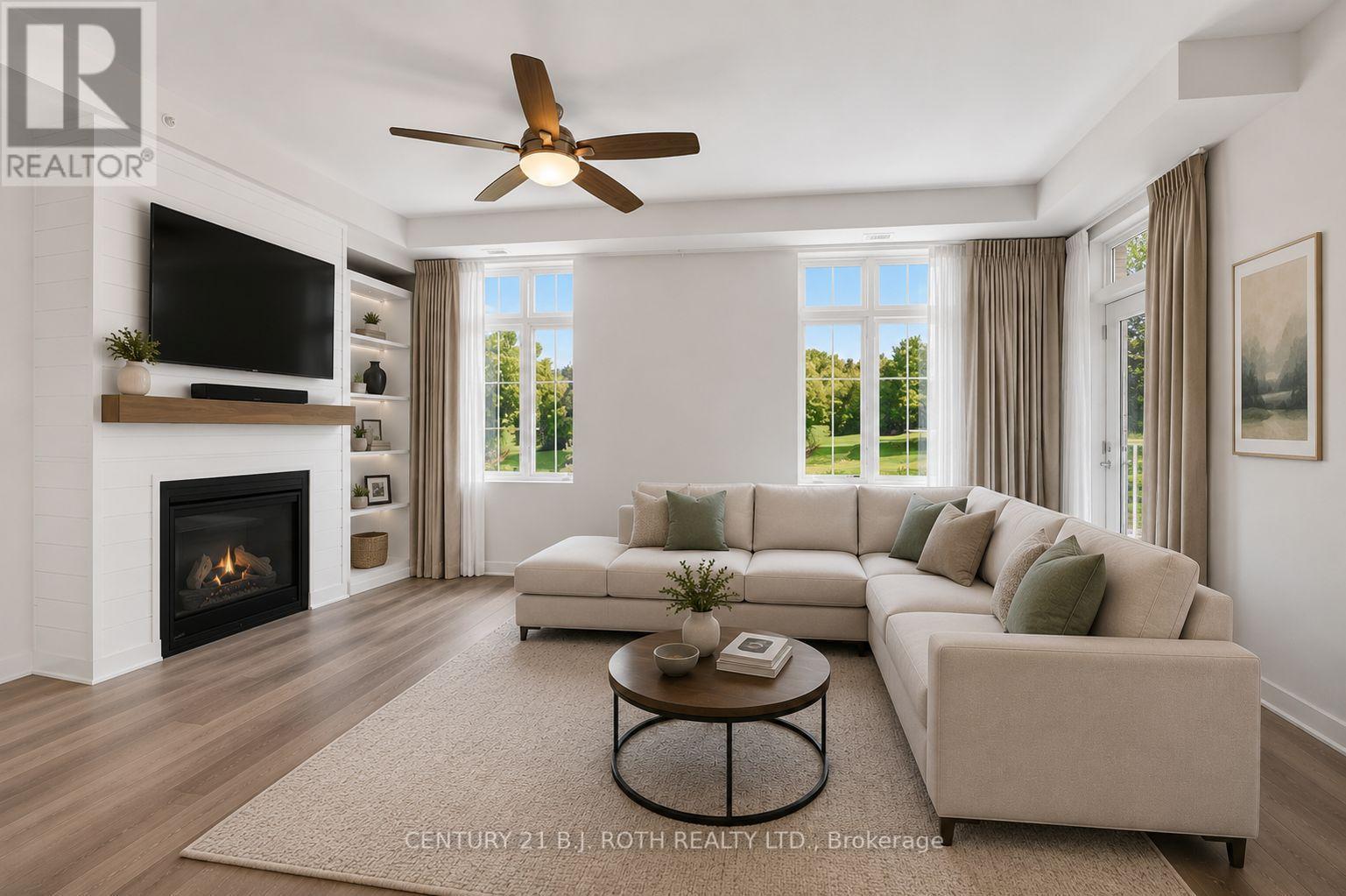 310 - 40 Horseshoe Boulevard, Oro-Medonte, ON - Indoor Photo Showing Living Room With Fireplace