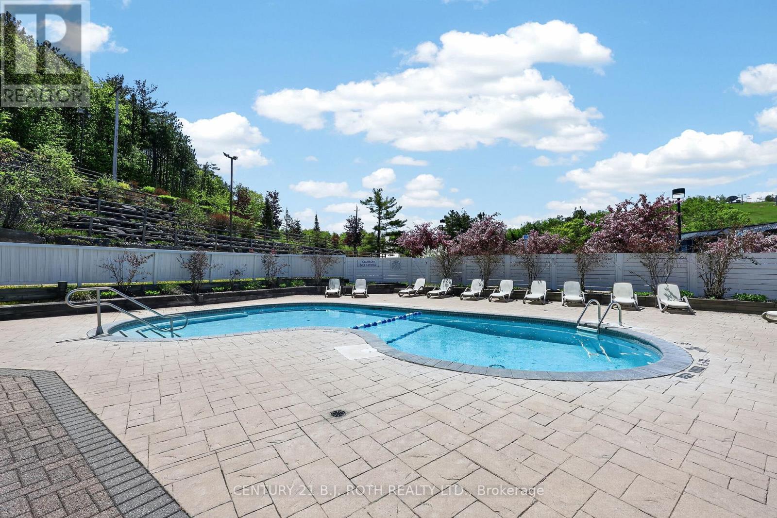 310 - 40 Horseshoe Boulevard, Oro-Medonte, ON - Outdoor With In Ground Pool With Backyard