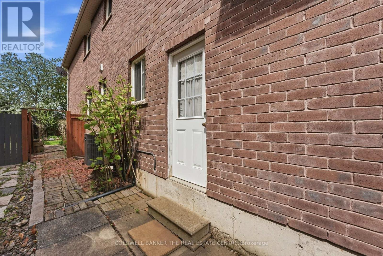 Side Entrance to Garage - 44 Prince William Way, Barrie, ON