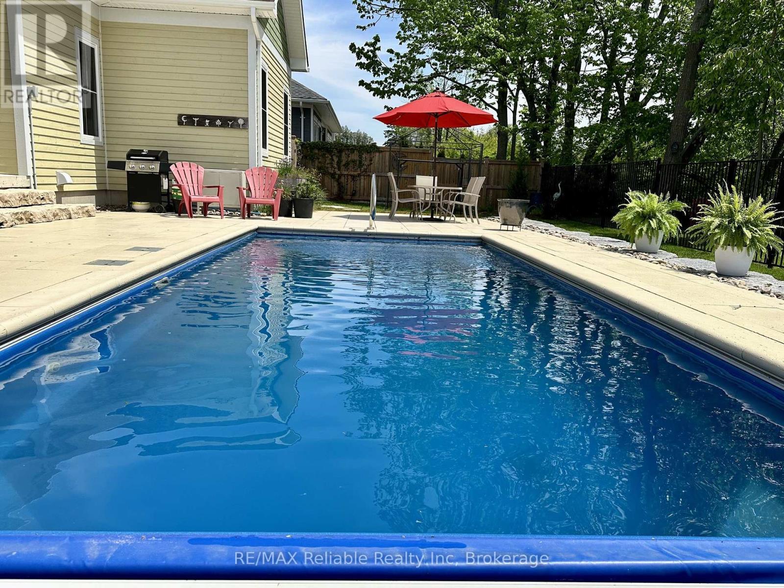 14 Thimbleweed Drive, Bluewater (Bayfield), ON - Outdoor With In Ground Pool