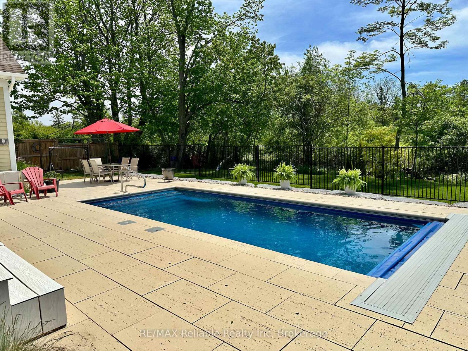 14 Thimbleweed Drive, Bluewater (Bayfield), ON - Outdoor With In Ground Pool With Backyard