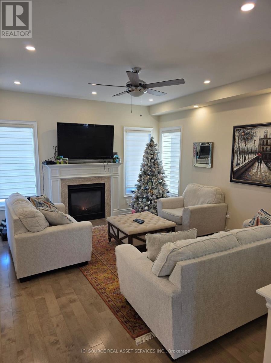 14 Boundary Creek Path, Brampton, ON - Indoor Photo Showing Living Room With Fireplace