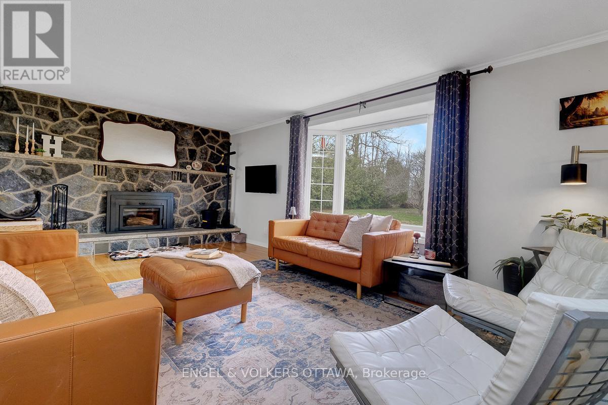 2963 Roger Stevens Drive E, Ottawa, ON - Indoor Photo Showing Living Room With Fireplace