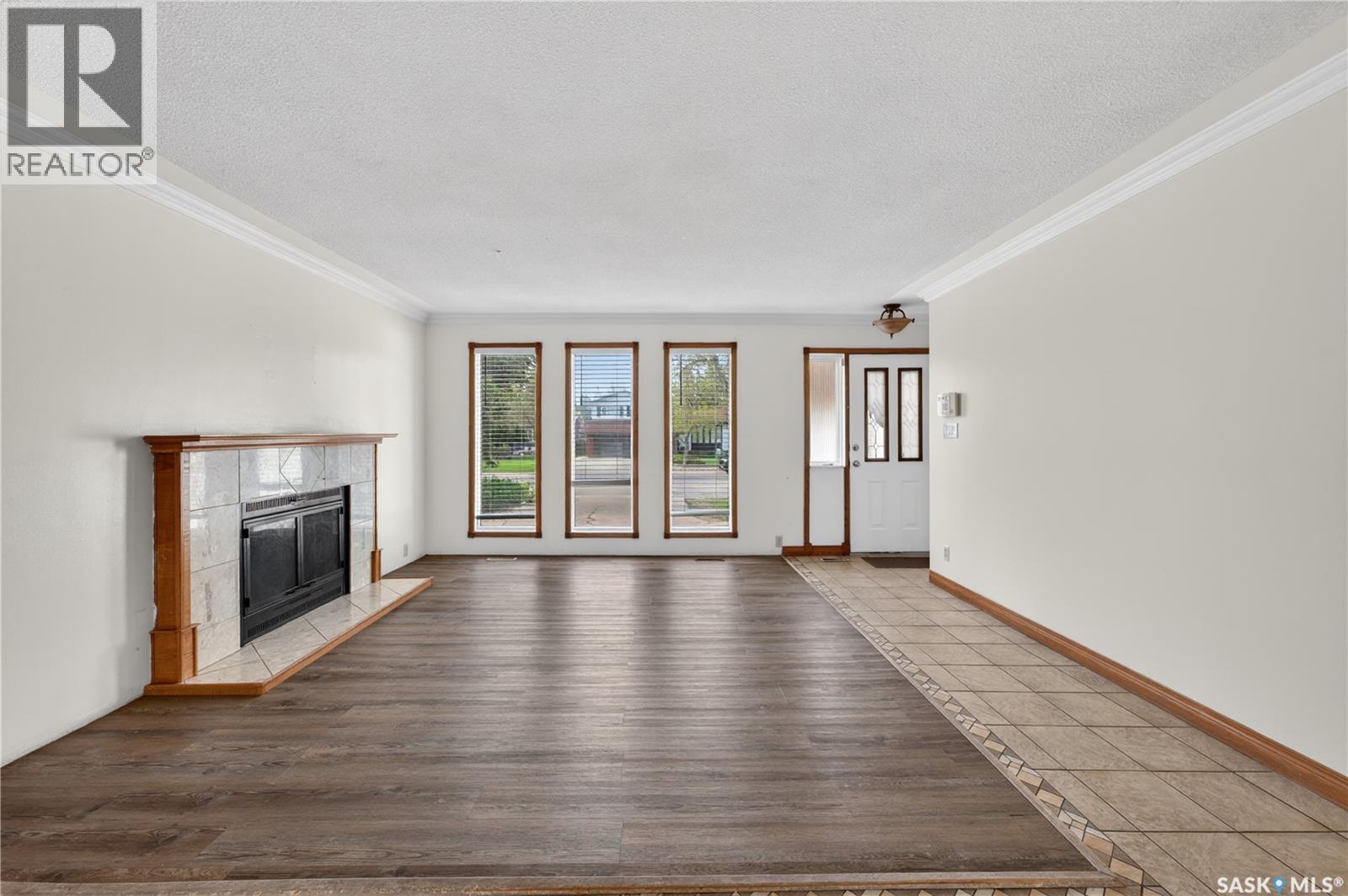 83 Groome Avenue, Regina, SK - Indoor With Fireplace