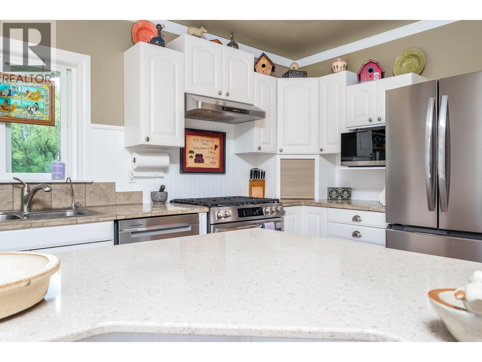 6934 Highway 6, Coldstream, BC - Indoor Photo Showing Kitchen With Double Sink