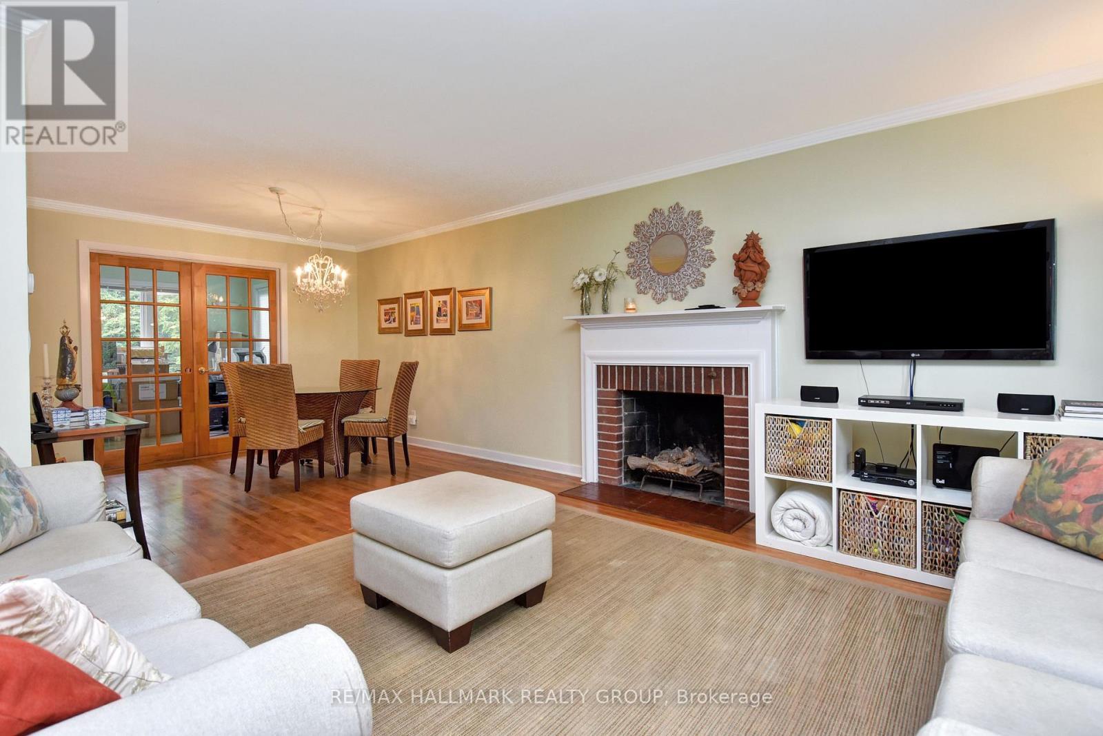 32 Arundel Avenue, Ottawa, ON - Indoor Photo Showing Living Room With Fireplace