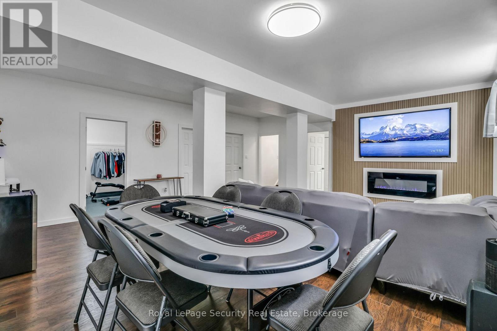 1280 Forest Street, Innisfil, ON - Indoor Photo Showing Dining Room With Fireplace
