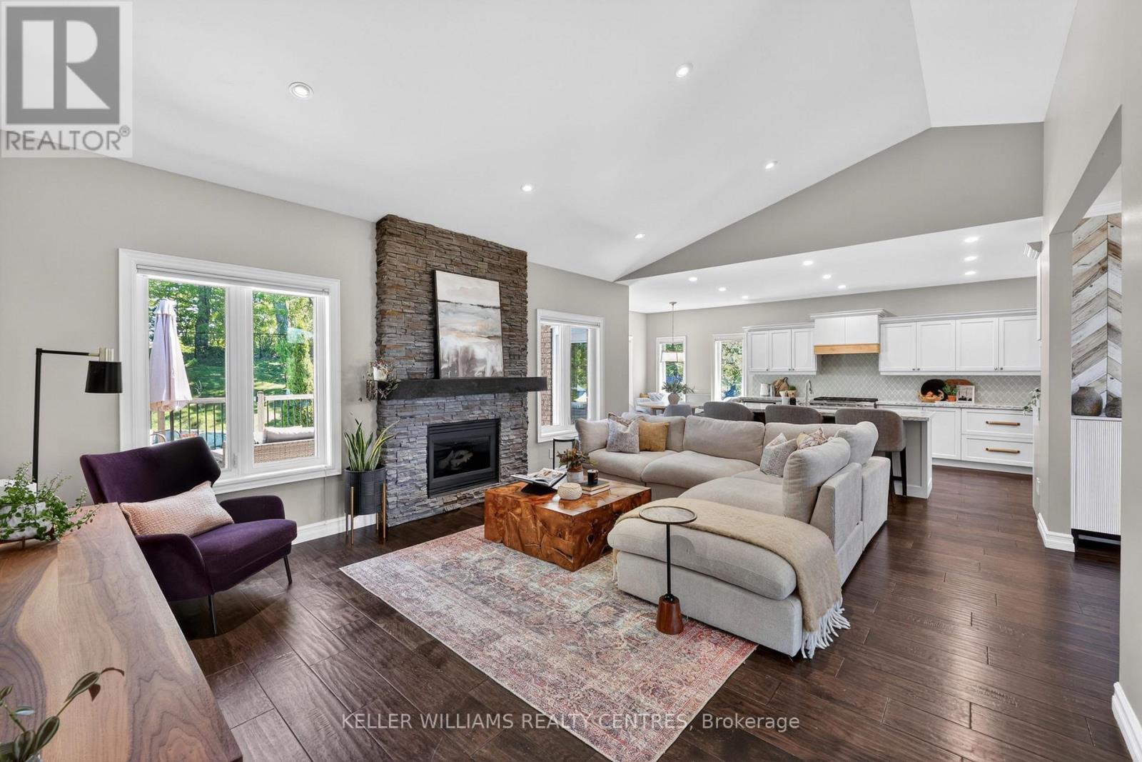 50 Glenhuron Drive, Springwater, ON - Indoor Photo Showing Living Room With Fireplace