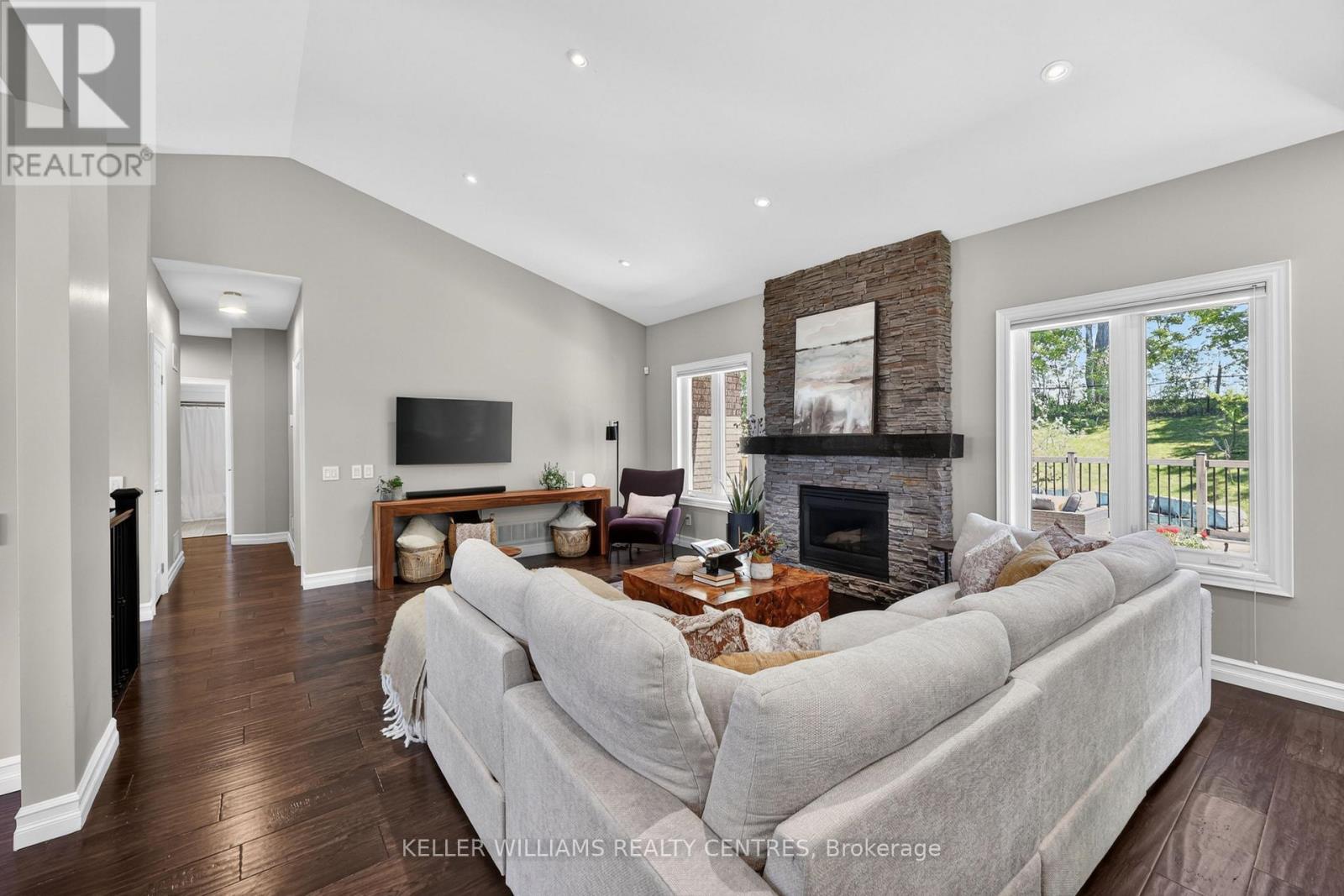 50 Glenhuron Drive, Springwater, ON - Indoor Photo Showing Living Room With Fireplace