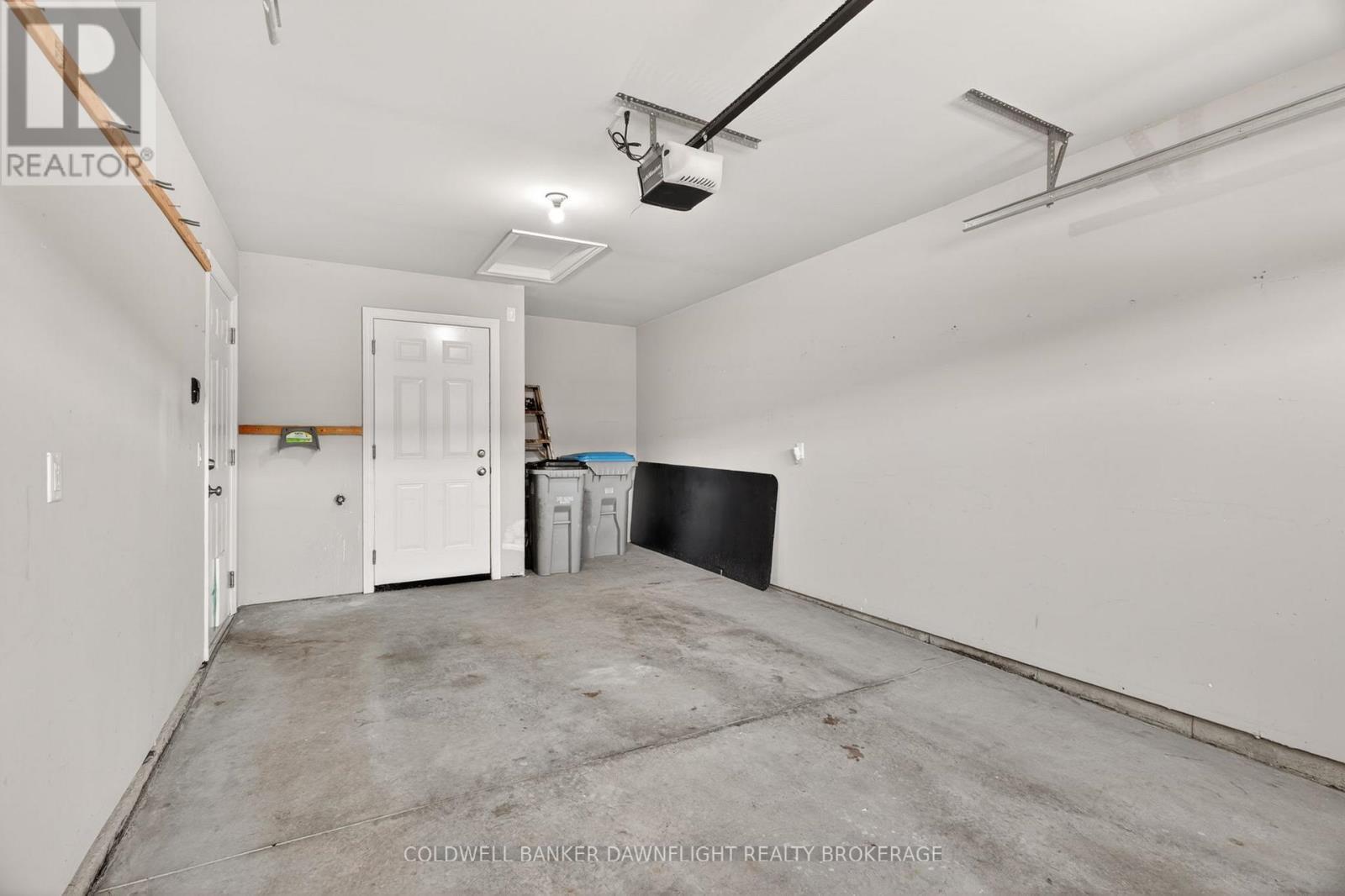 18 Devon Drive, South Huron (Exeter), ON - Indoor Photo Showing Garage