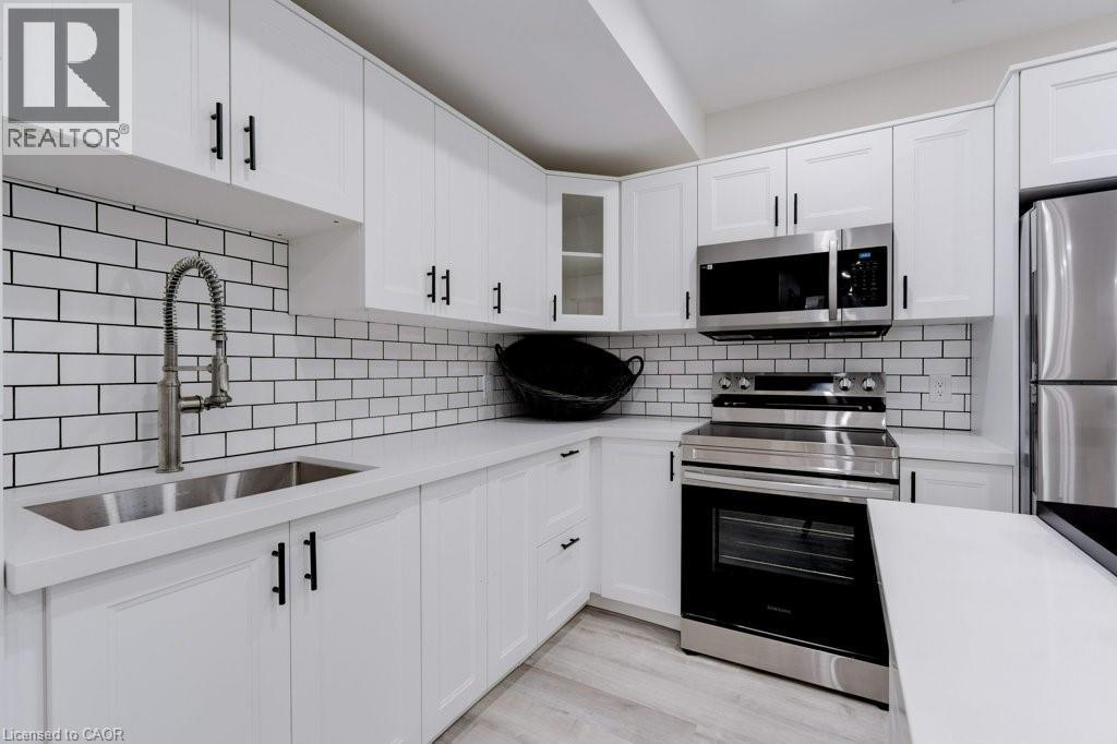 UNIT B - 38 East 16Th Street, Hamilton, ON - Indoor Photo Showing Kitchen With Double Sink