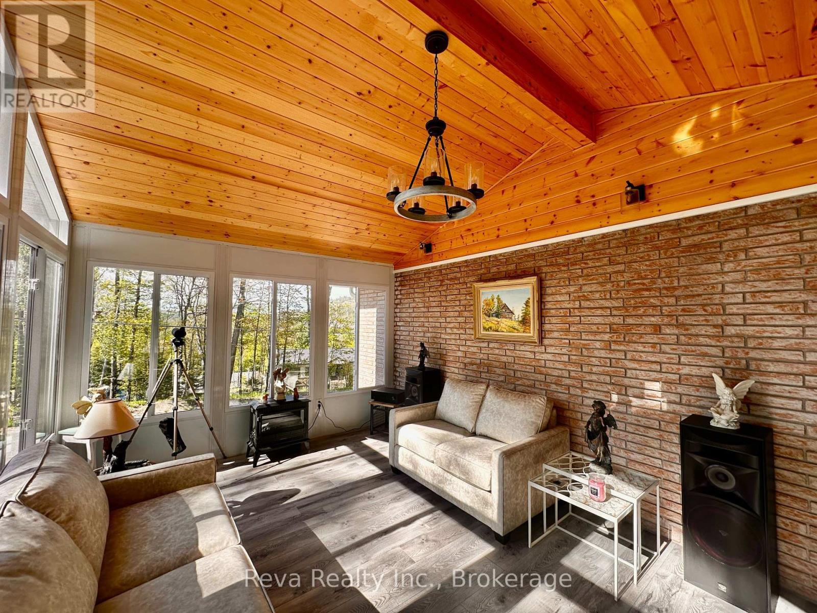 Sunroom with View of the Eagles nest - 11 Ridge Road, Bancroft (Bancroft Ward), ON - Indoor Photo Showing Living Room