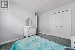 Neutral tone walls with white baseboards and trim -