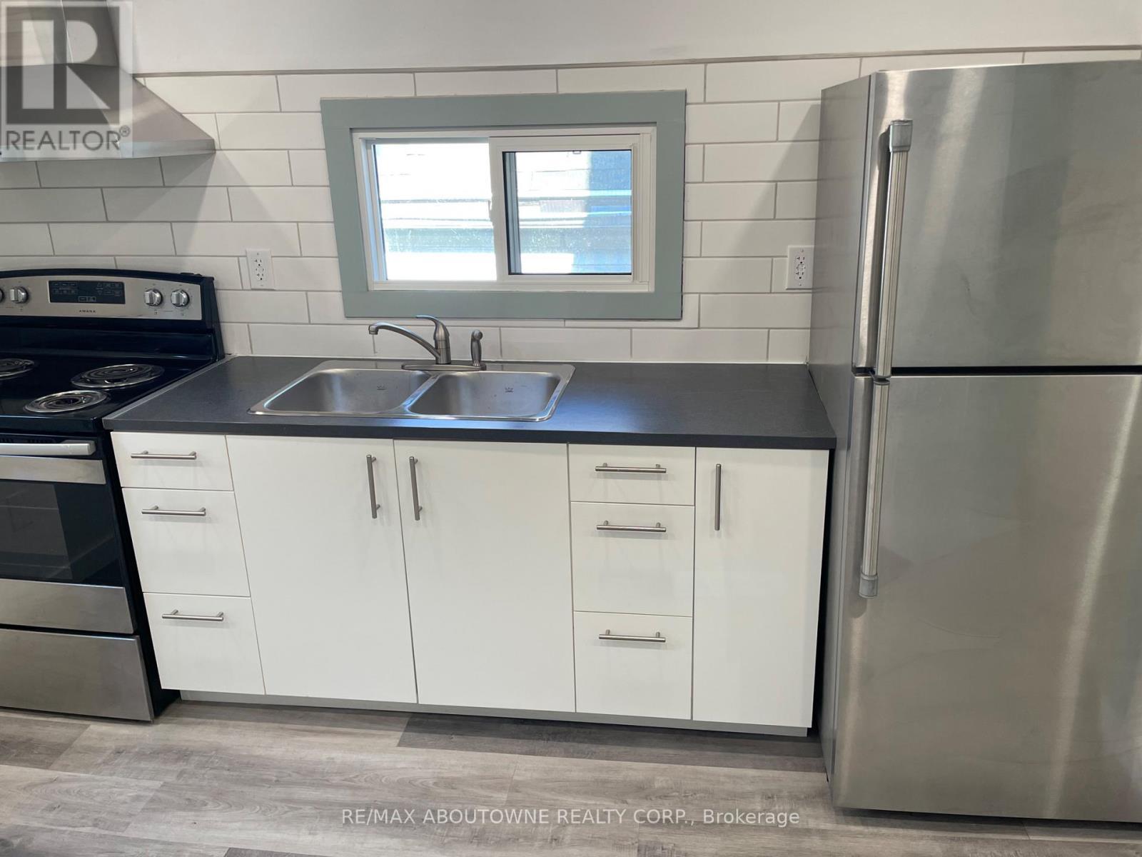 759 Barton Street E, Hamilton, ON - Indoor Photo Showing Kitchen With Double Sink