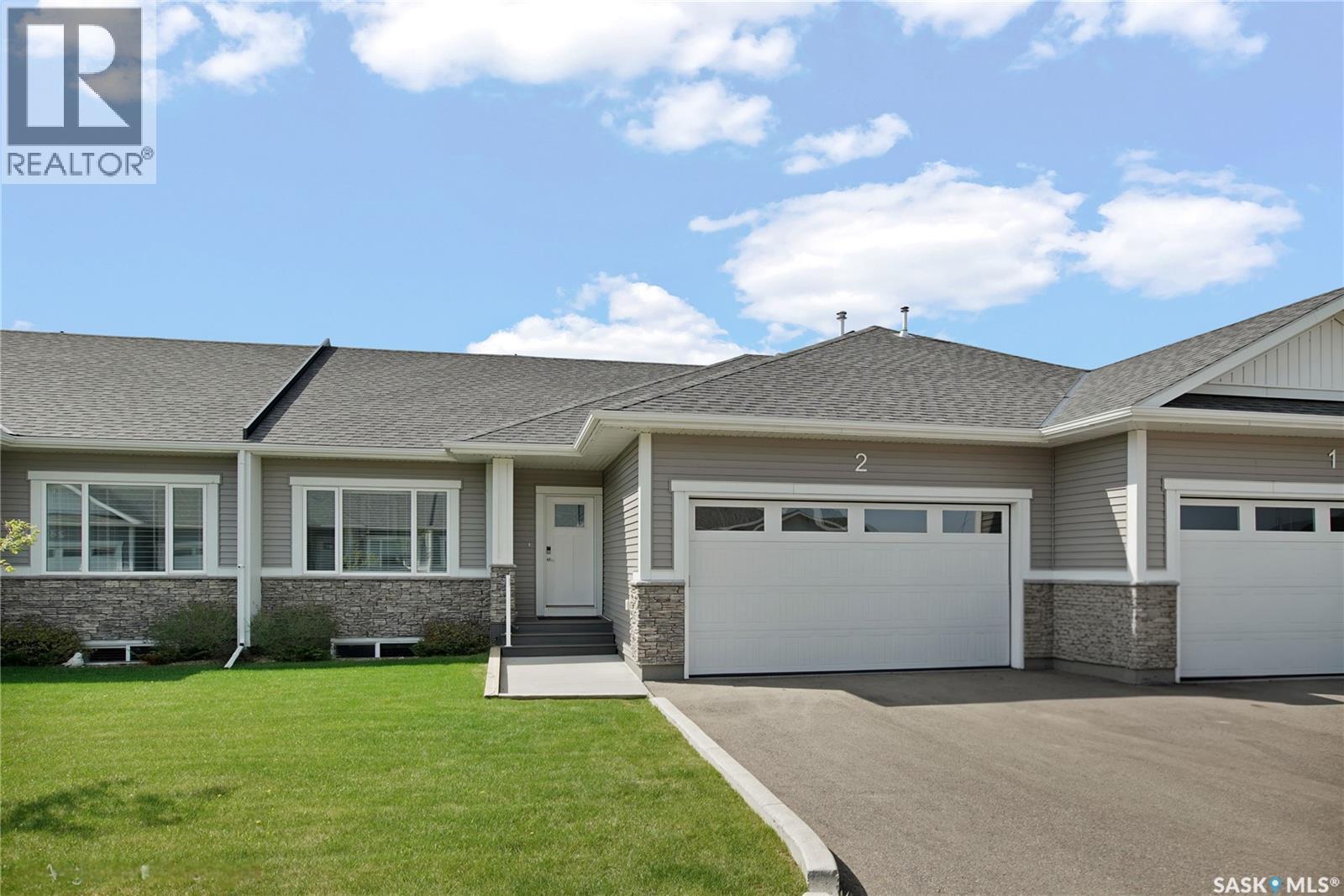 2 437 Palmer Crescent, Warman, SK - Outdoor With Facade