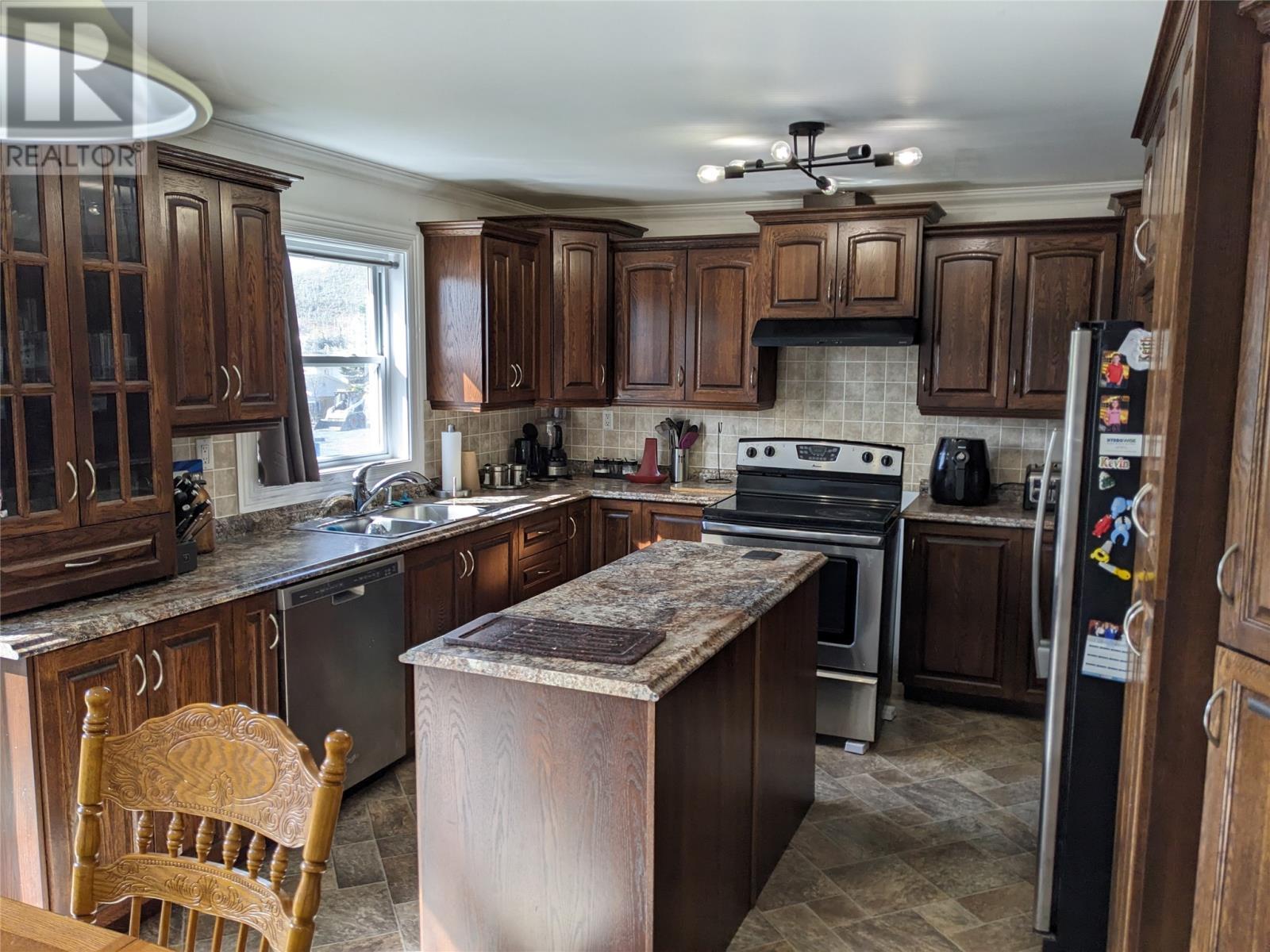 12 Forest Road, Mings Bight, NL - Indoor Photo Showing Kitchen With Double Sink