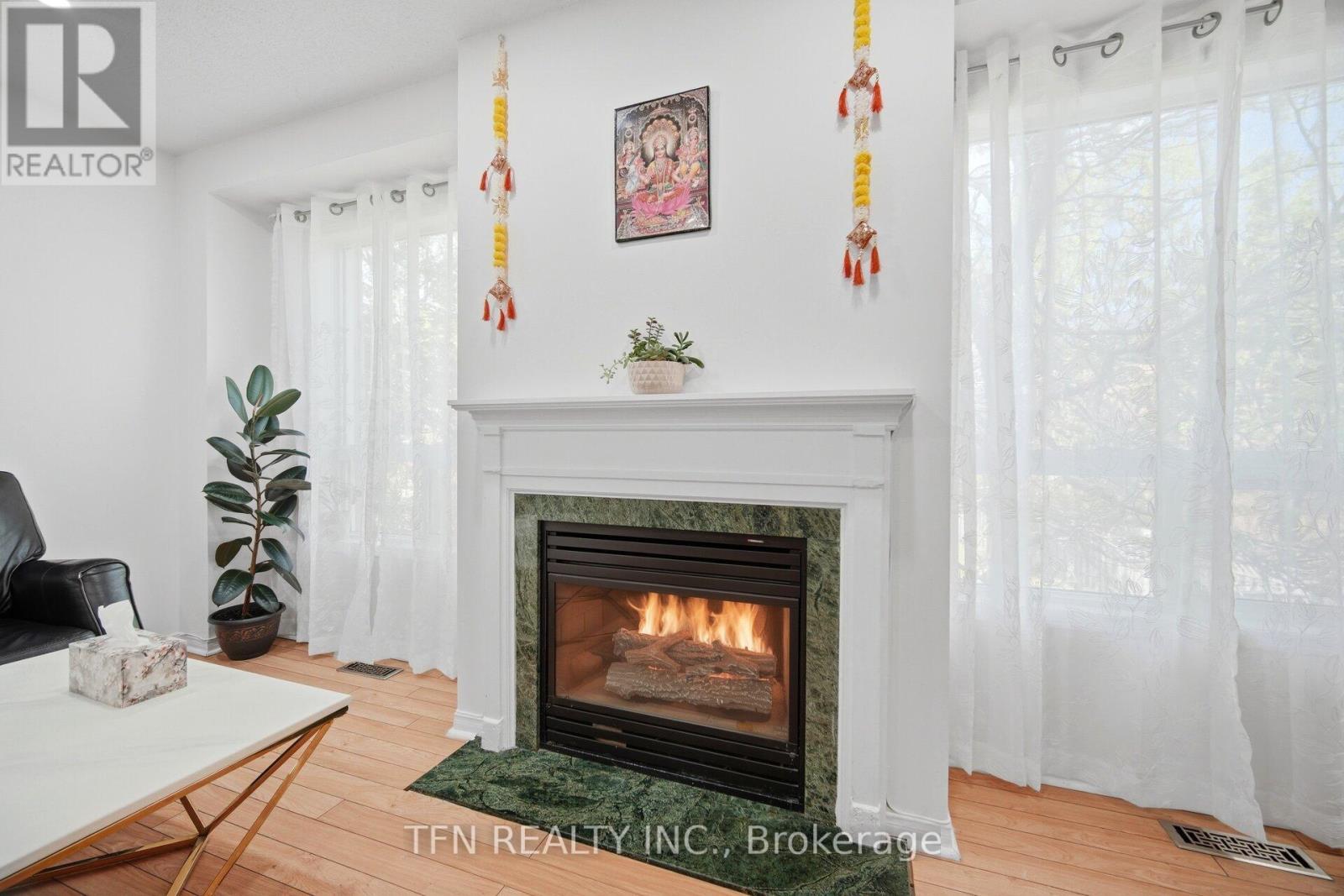 123 Brickyard Way, Brampton, ON - Indoor Photo Showing Living Room With Fireplace
