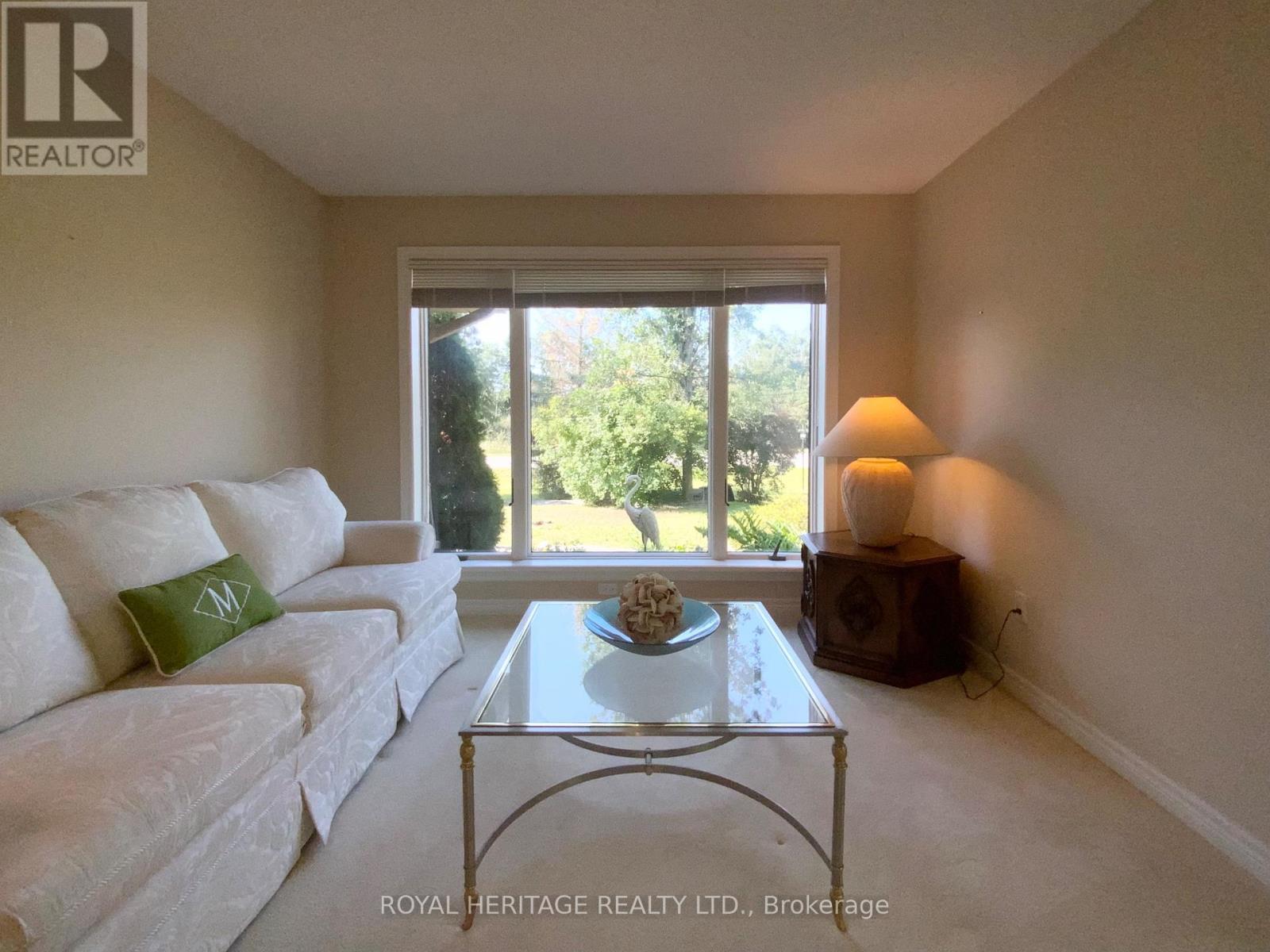L/L FIREPLACE SEATING AREA - 2 Mill Street, Kawartha Lakes (Bobcaygeon), ON - Indoor Photo Showing Living Room With Fireplace