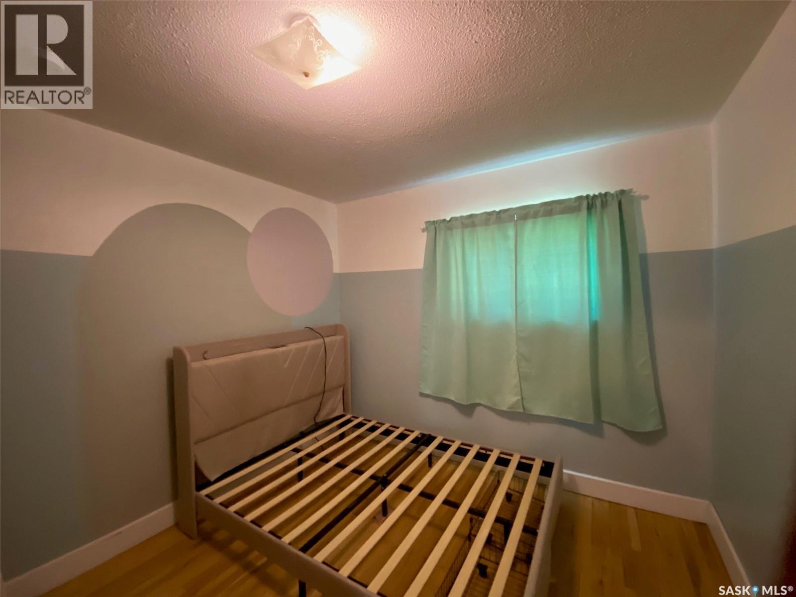 210 First Avenue, Yorkton, SK - Indoor Photo Showing Bedroom