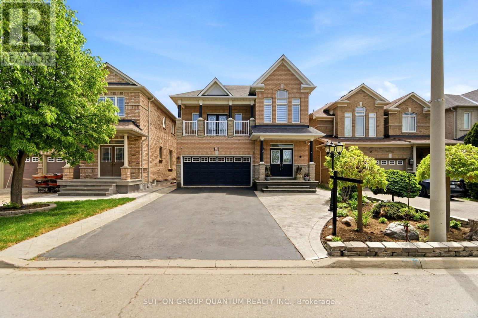 Front from drone - 35 Devonsleigh Drive, Brampton, ON - Outdoor With Balcony With Facade