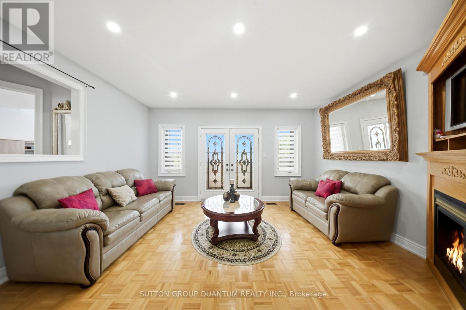Second family room area on second level - 35 Devonsleigh Drive, Brampton, ON - Indoor Photo Showing Living Room With Fireplace