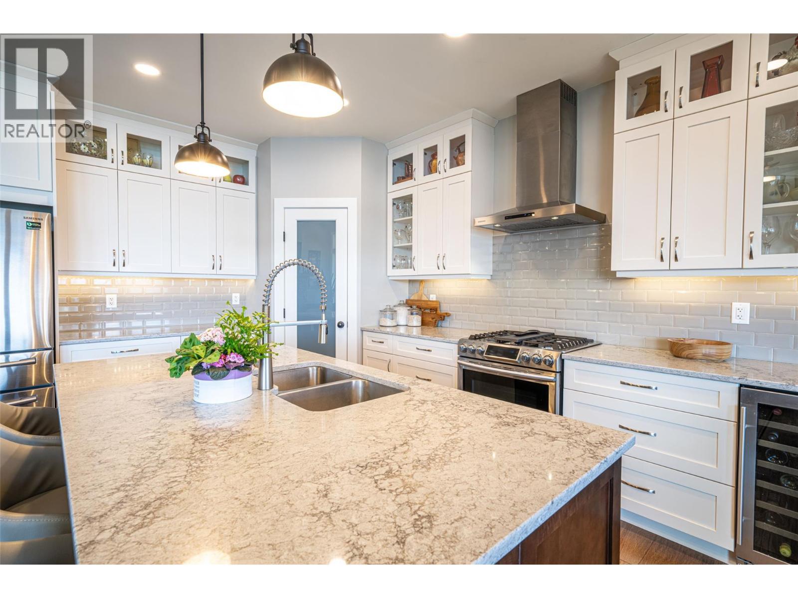 Kitchen - 132 Crown Crescent, Vernon, BC - Indoor Photo Showing Kitchen With Double Sink With Upgraded Kitchen