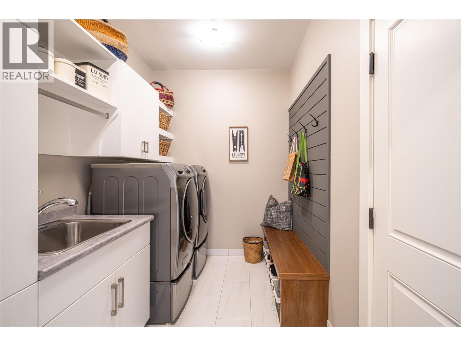 Laundry on main floor - 132 Crown Crescent, Vernon, BC - Indoor Photo Showing Laundry Room