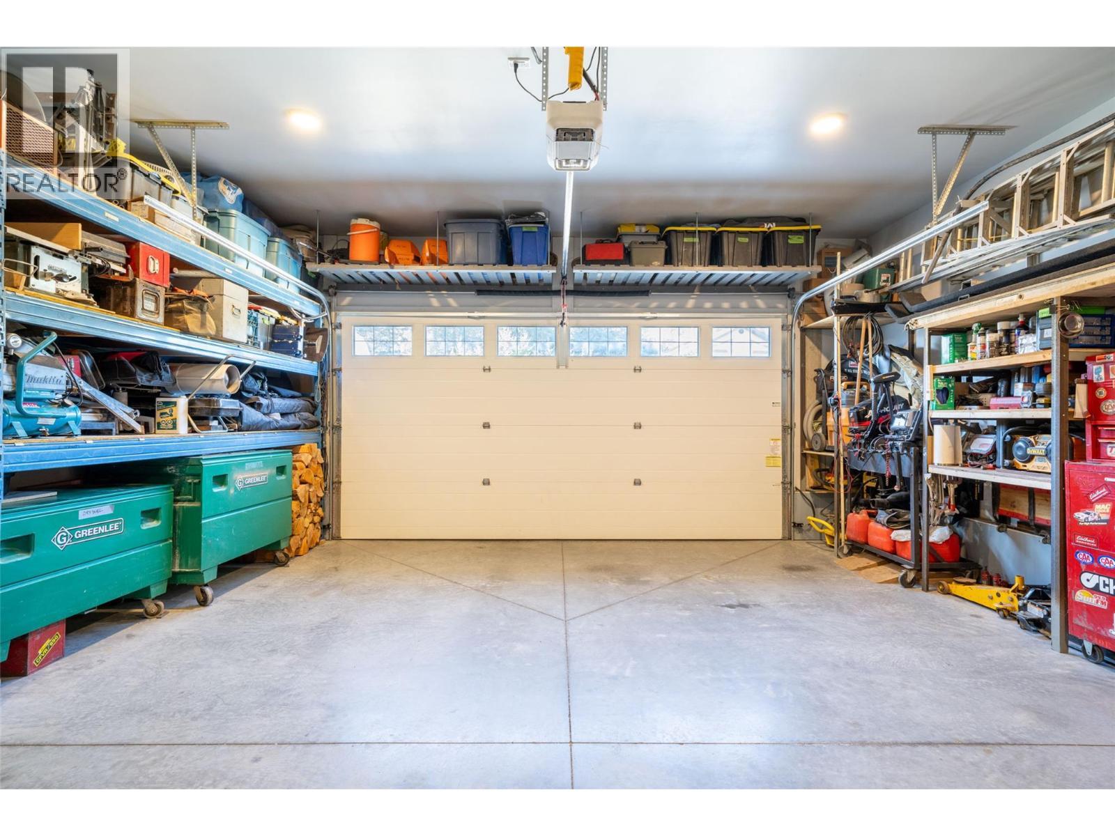 Oversized double garage - 132 Crown Crescent, Vernon, BC - Indoor Photo Showing Garage