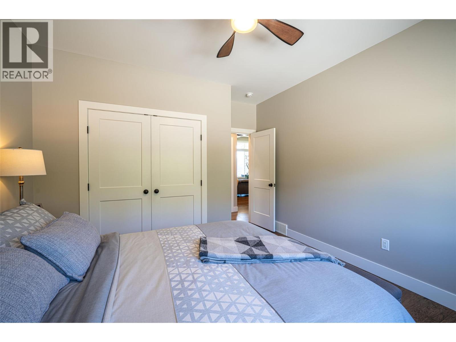 Second bedroom on main floor - 132 Crown Crescent, Vernon, BC - Indoor Photo Showing Bedroom