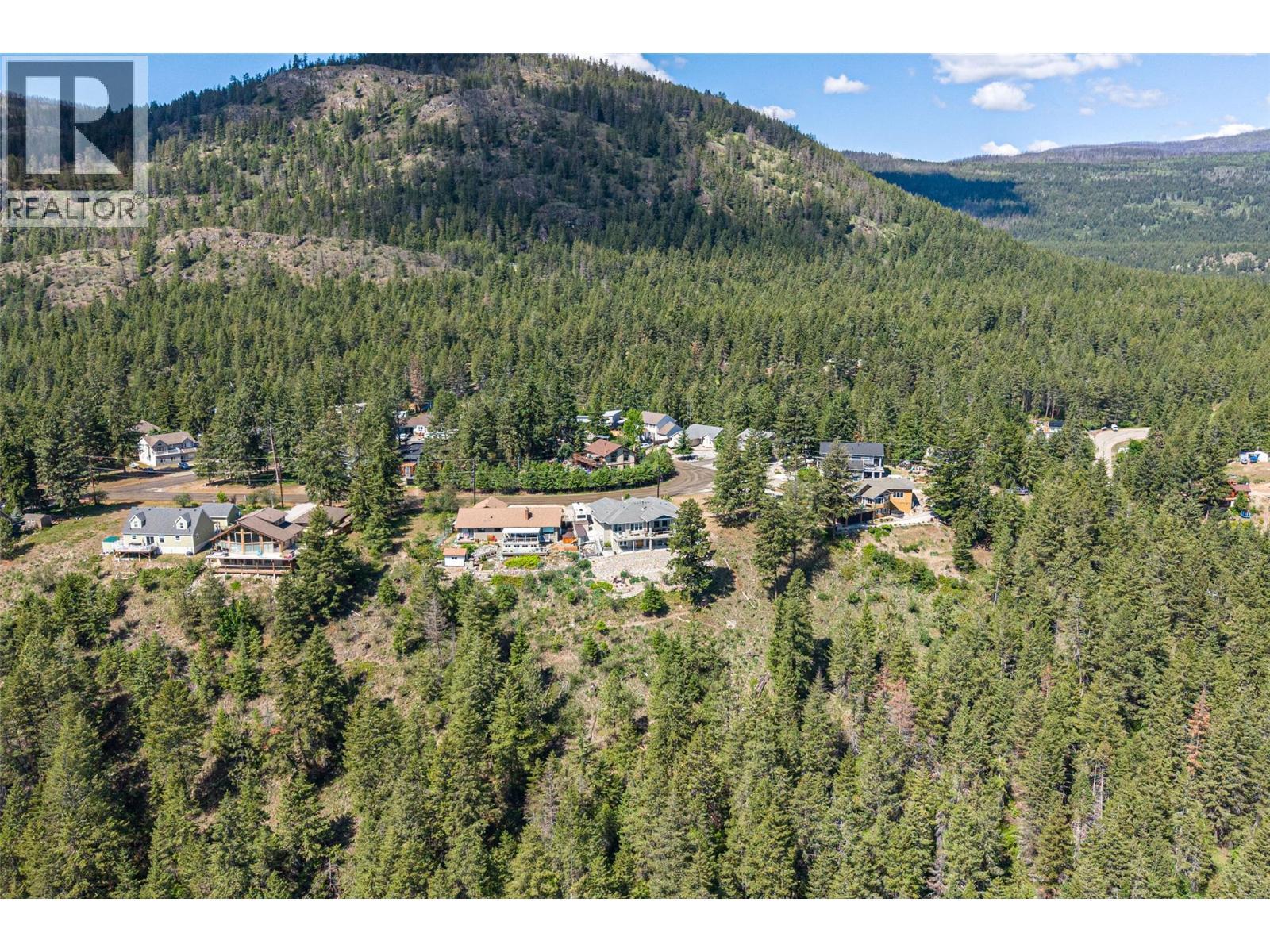 Perched at the peak of Crown Crescent in prestigious Westshore Estates - 132 Crown Crescent, Vernon, BC - Outdoor With View
