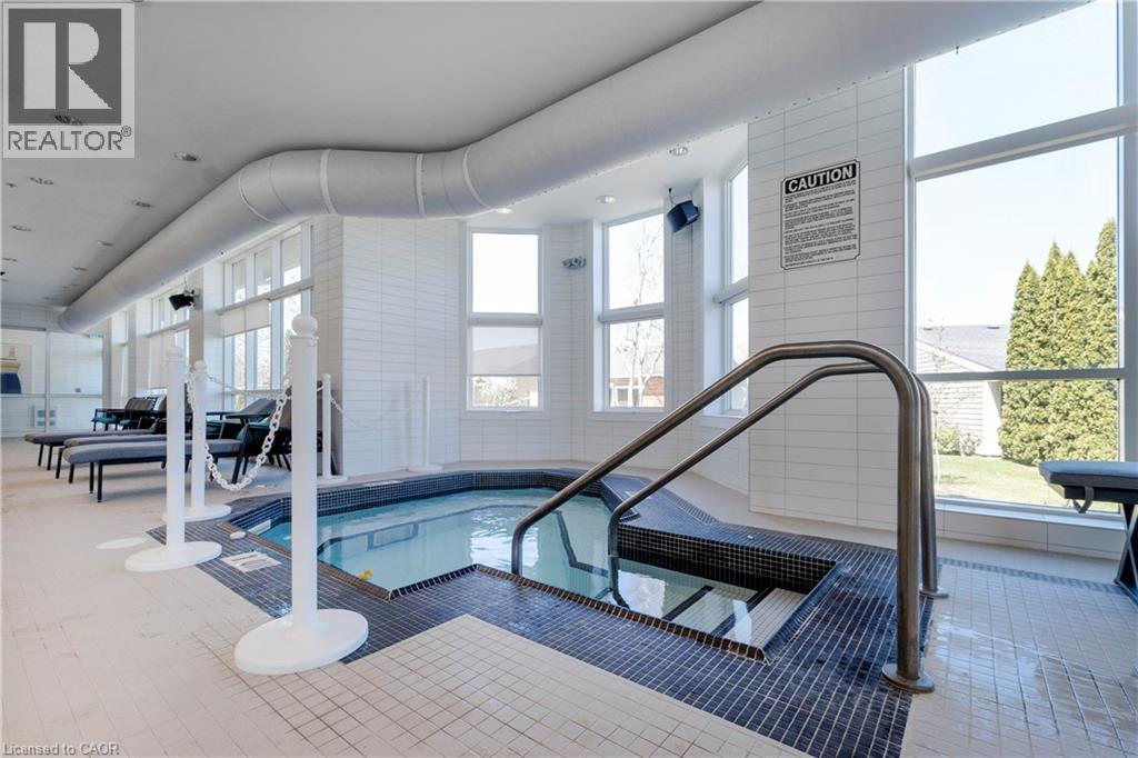 Amenities located within St. Elizabeth Village - 10 Archdeacon Clark Trail, Hamilton, ON - Indoor Photo Showing Other Room With In Ground Pool