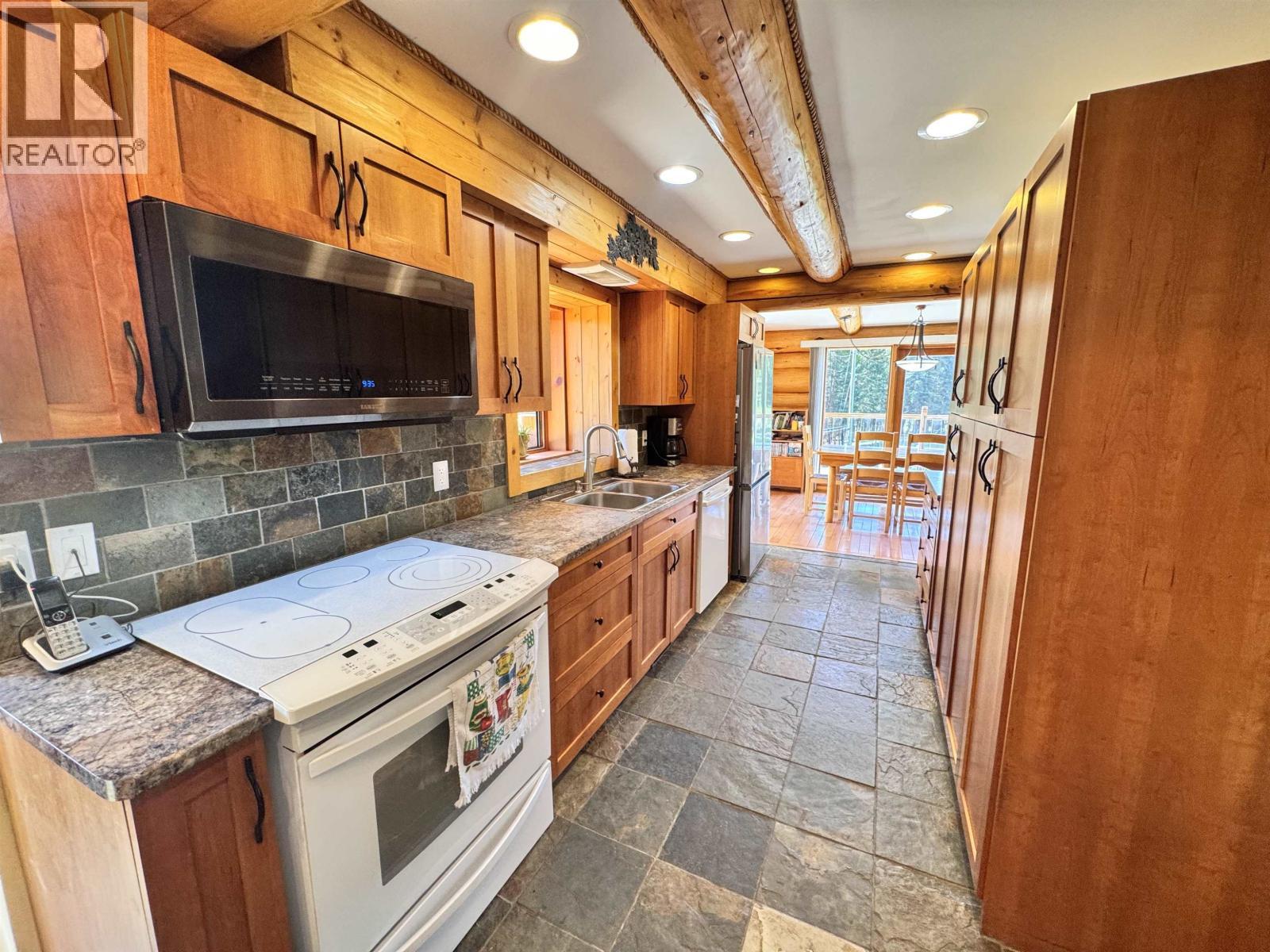 4485 Trip Road, 100 Mile House, BC - Indoor Photo Showing Kitchen With Double Sink