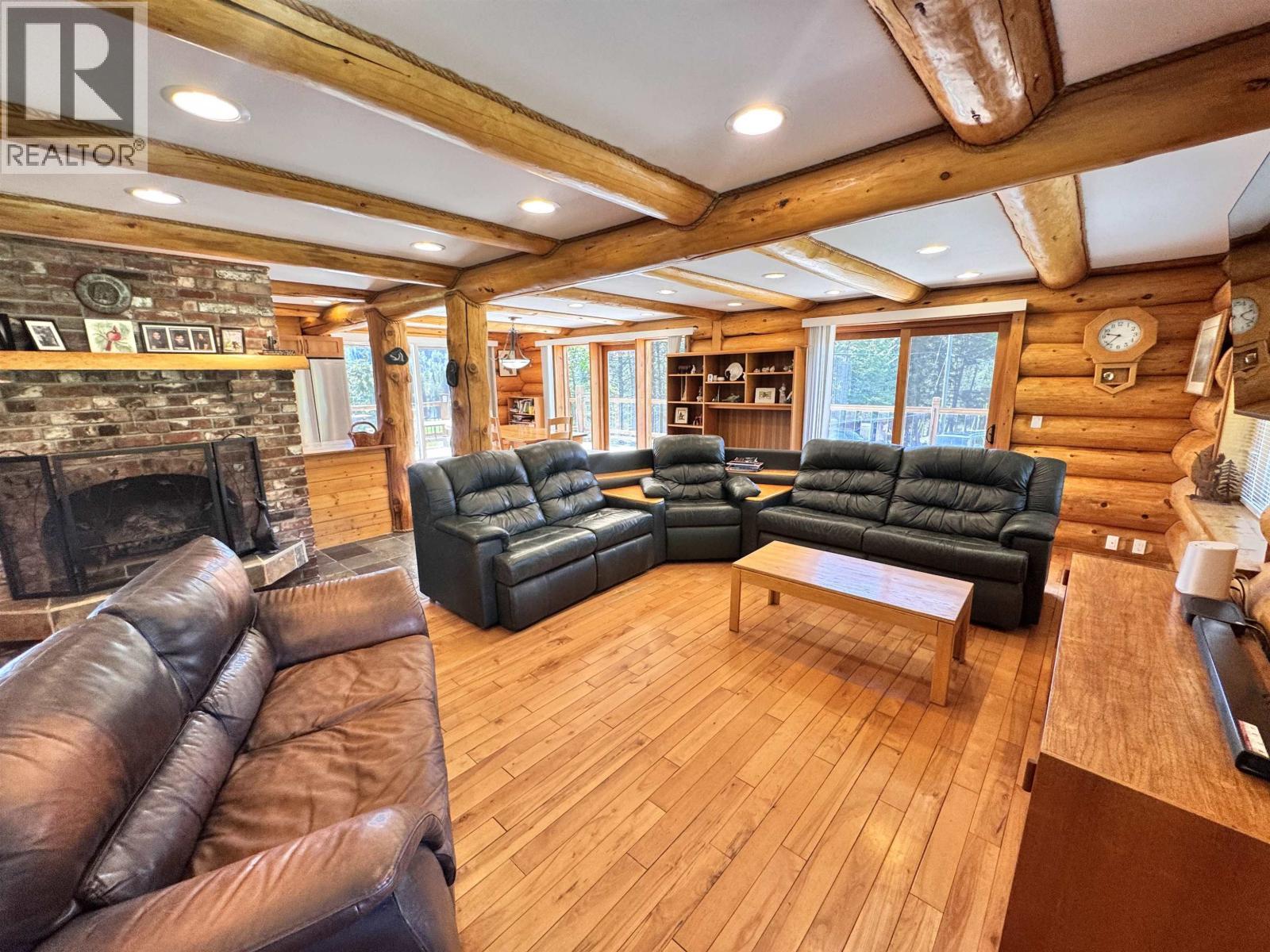 4485 Trip Road, 100 Mile House, BC - Indoor Photo Showing Living Room With Fireplace