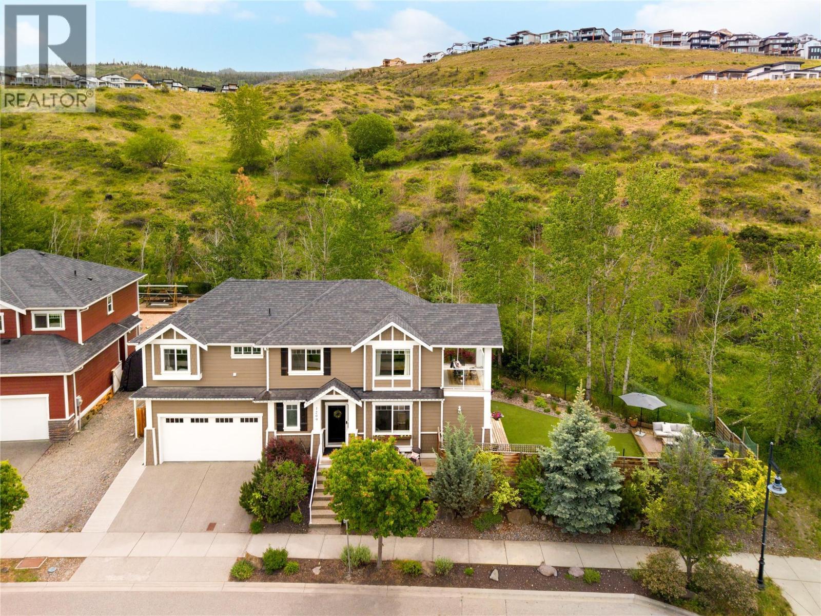 1209 Bergamot Avenue, Kelowna, BC - Outdoor With Facade