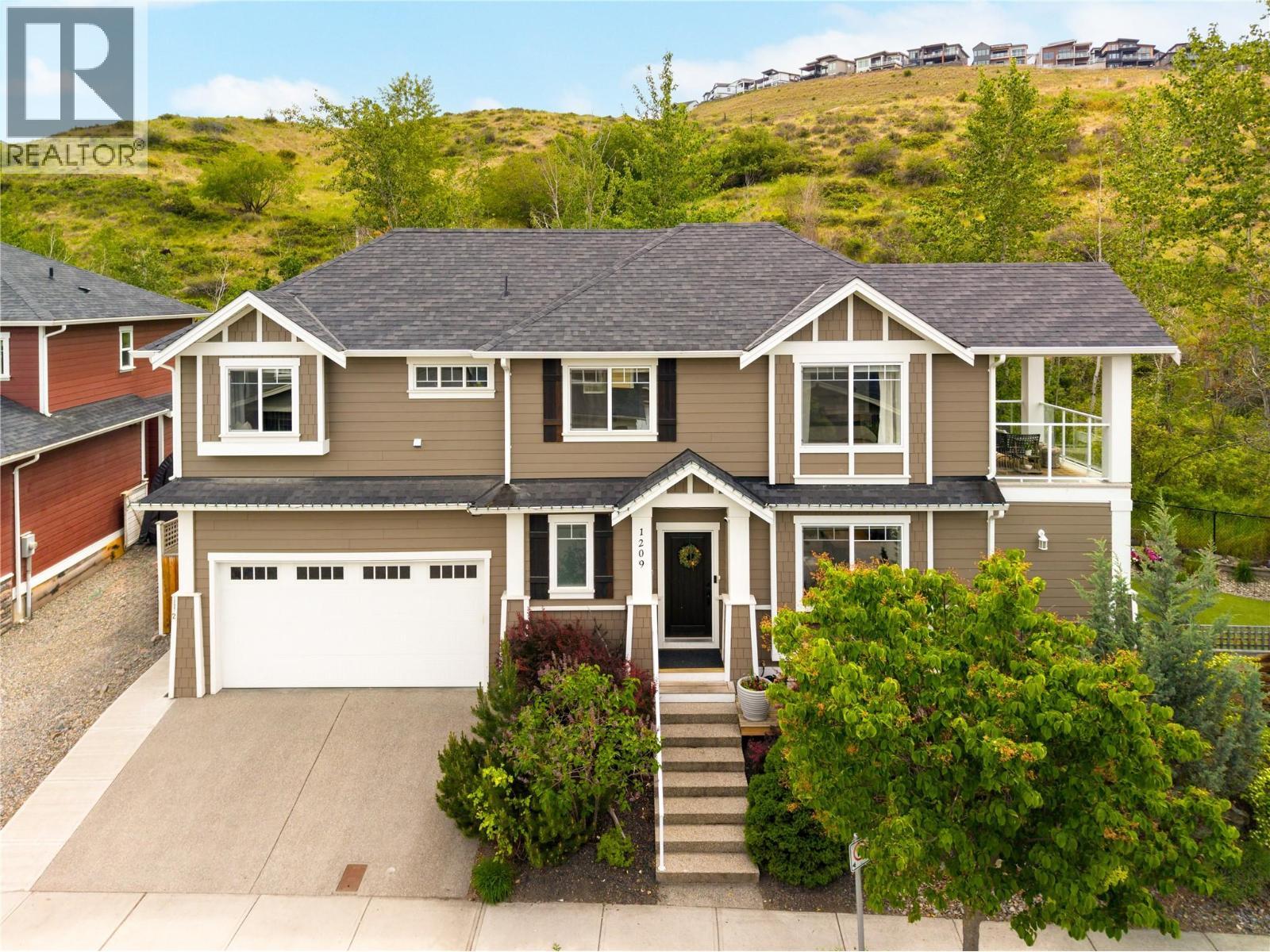 1209 Bergamot Avenue, Kelowna, BC - Outdoor With Facade