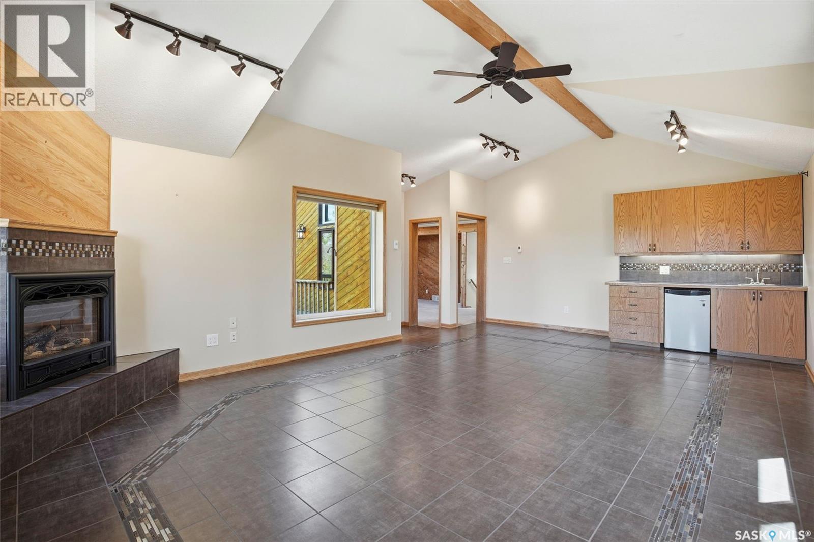 818 Pukwana Drive, Manitou Beach, SK - Indoor With Fireplace