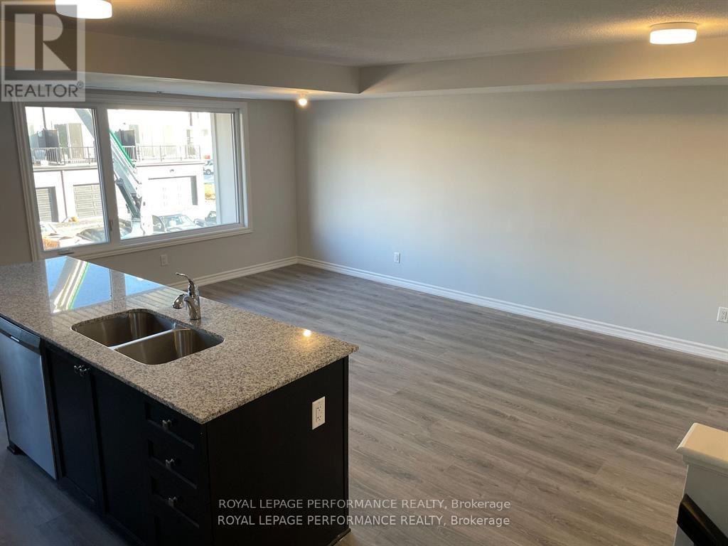 704 Kizis Private, Ottawa, ON - Indoor Photo Showing Kitchen With Double Sink