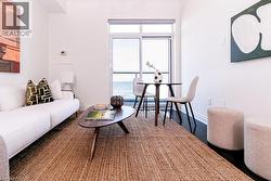 Floor-to-ceiling sliding glass doors provide natural light -