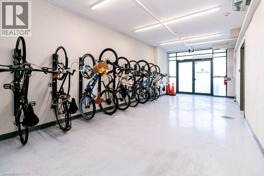Dedicated bike storage area featuring wall-mounted racks - 101 Shoreview Place Unit# 631, Stoney Creek, ON - Indoor Photo Showing Gym Room