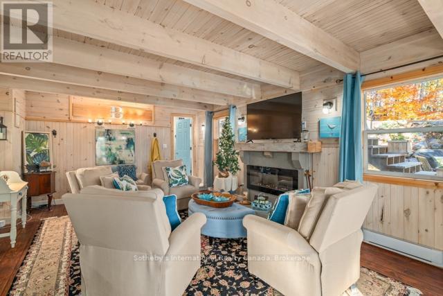 5 - 1028 Oak Street, Muskoka Lakes (Medora), ON - Indoor With Fireplace